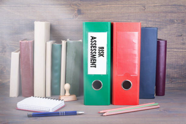 istock Risk Assessment. Binder on desk in the office. Business background 827349300