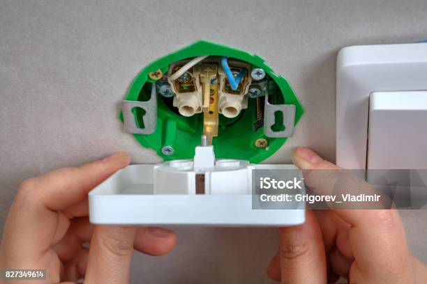 Wall Socket In Ceiling Installation Of Wall Socket In The Junction Box Hands Closeup Stock ...