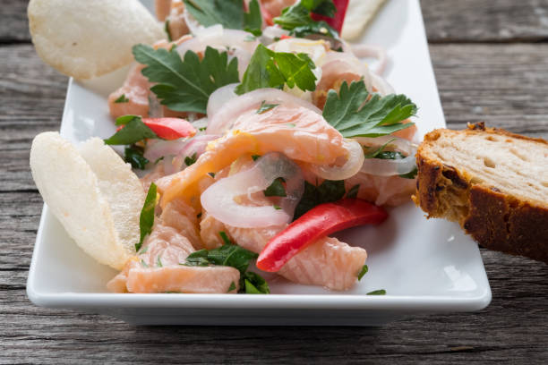 istock Snack ceviche with salmon and onions 827358820