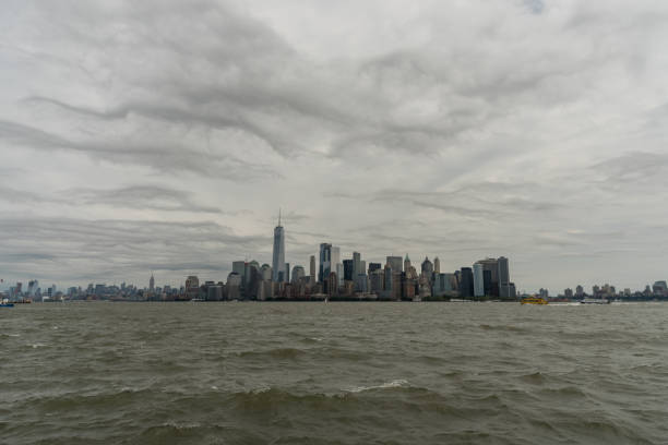 istock Manhattan skyline viewed from the water 827359494