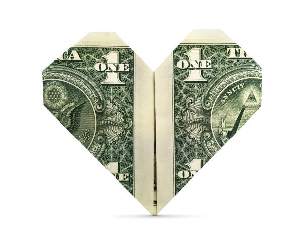 Isolated Origami Heart Money love on a white background. american one dollar bill photos stock pictures, royalty-free photos & images