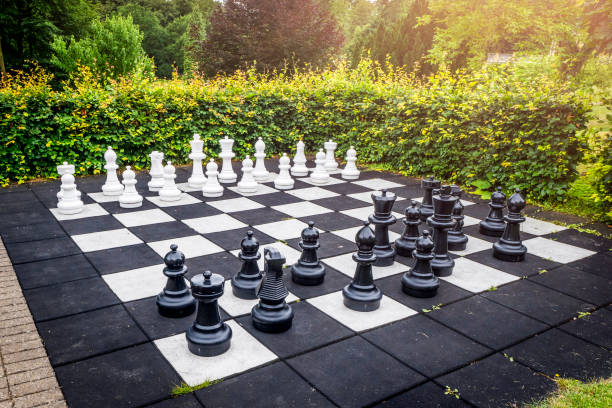 istock Large outdoor chess game on a garden terrace 827366528