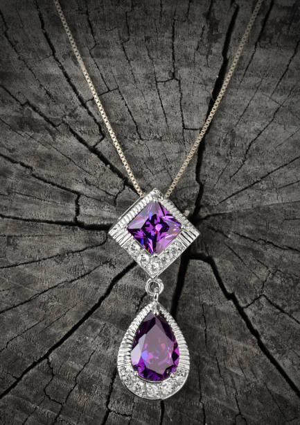 istock Jewelry pendant on black wood background 827373598