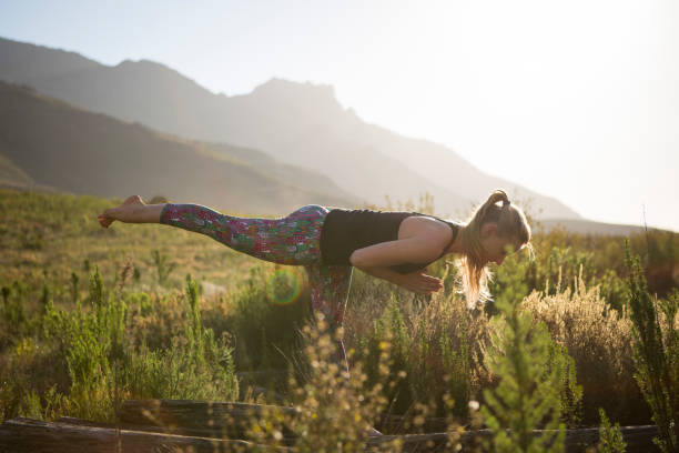 istock Balance - Yoga outdoors in nature 827376660