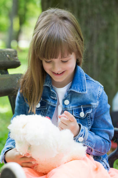 istock She plays with her favorite  stuffed toy 827376744