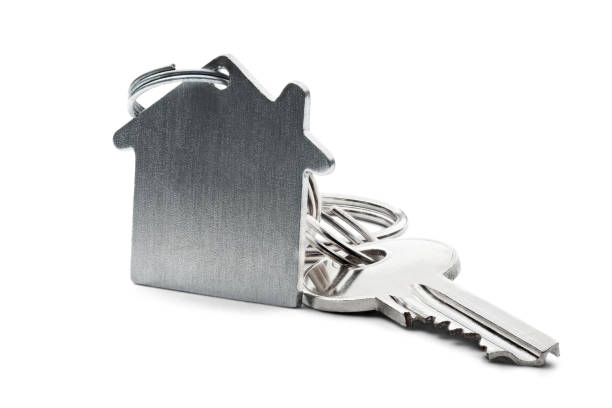 istock Estate concept, key ring and keys on isolated background 827383690