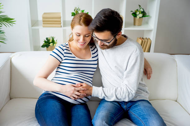 istock Pregnant woman with husband 827386050