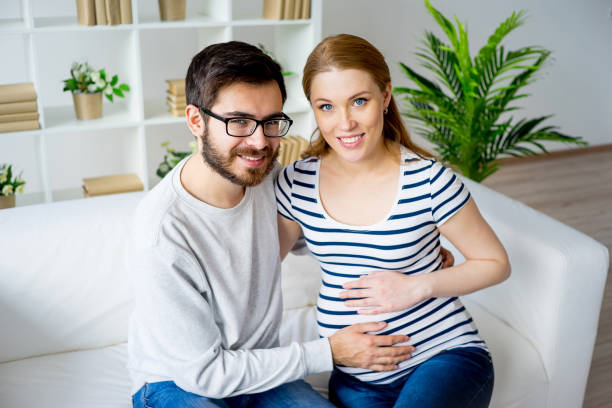 istock Pregnant woman with husband 827387014