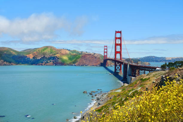 istock Golden Gate Bridge over pacific ocean on Big Sur. 827394614