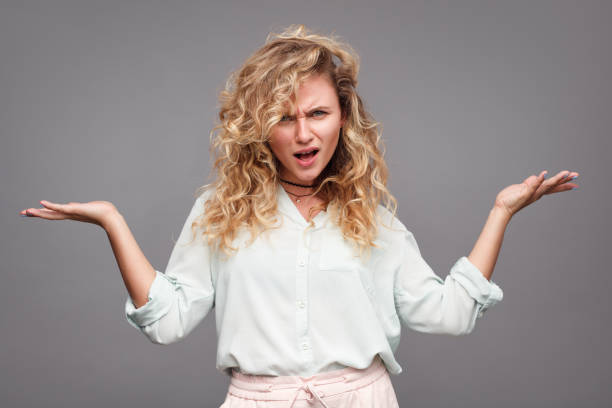 istock Woman in white clothes holding hands 827403920