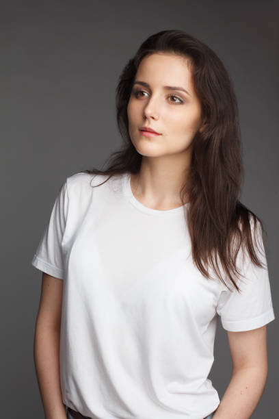 istock young female model in white t-shirt 827410484