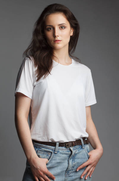 istock young female model in white t-shirt 827410490
