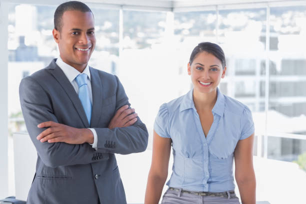 istock Confident business team smiling at camera 827413566