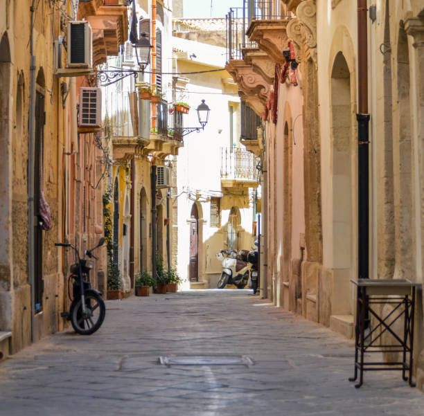 istock Medieval street in Ortygia, Sicily, Italy 827414028