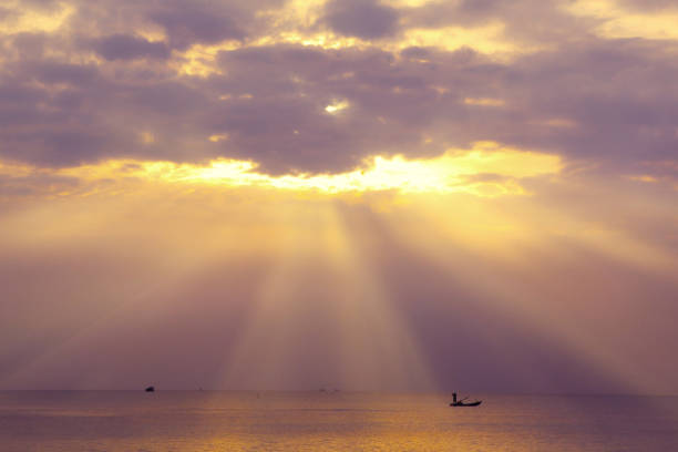 colorful sunset on Phu Quock island Vietnam sun ray go through the cloud