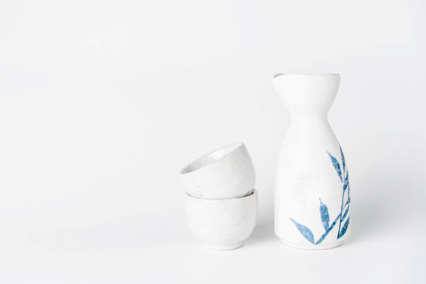 istock Close up of Japanese Sake drinking set on a white background. 827429434