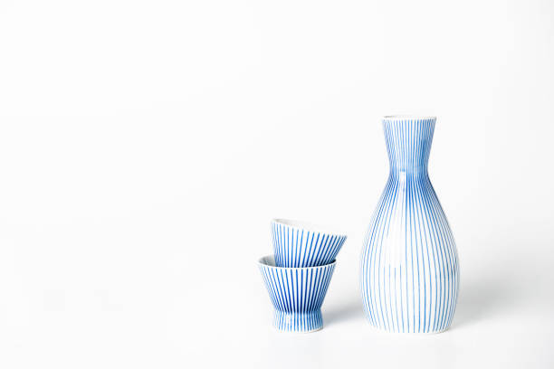 istock Close up of Japanese Sake drinking set on a white background. 827429436
