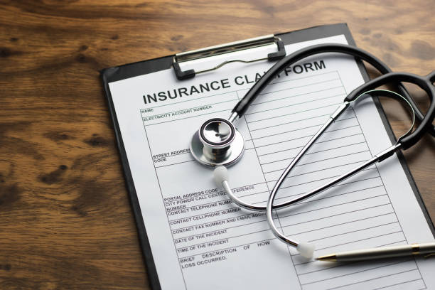 istock health insurance claim form with stethoscope on wood table selective focus 827429692