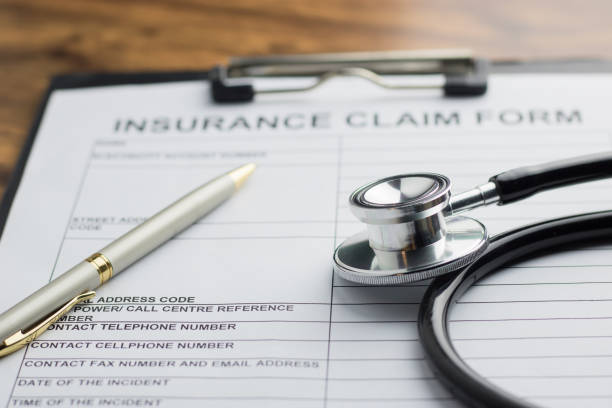 istock health insurance claim form with stethoscope on wood table selective focus 827429710