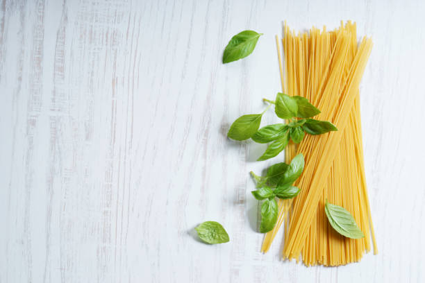 dried pasta, spaghetti, with fresh basil