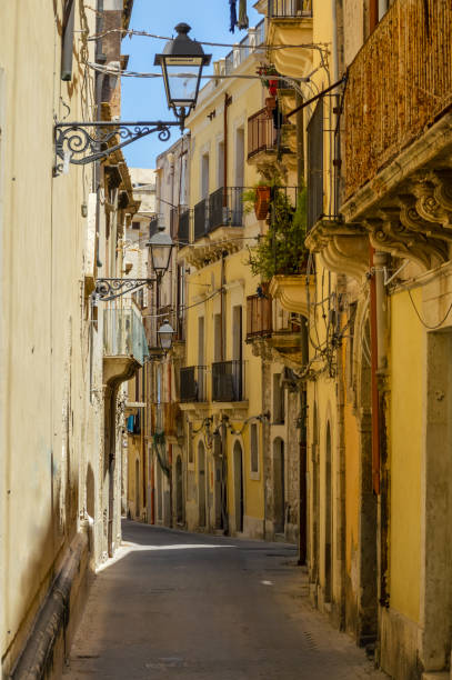 istock Medieval street in Ortygia, Sicily, Italy 827430222