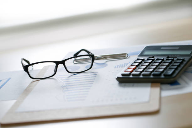 istock Checking financial reports paperwork and Business  Teamwork on table calculating or checking balance 827441692