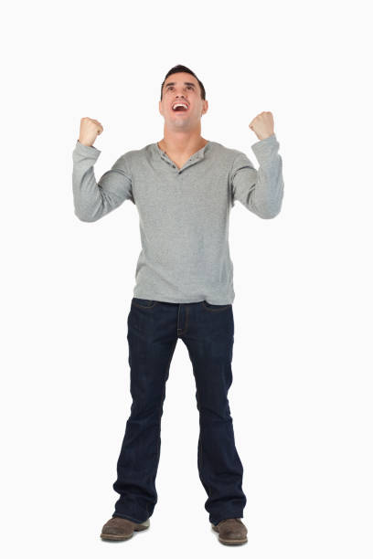 istock Young male celebrating a victory 827441910