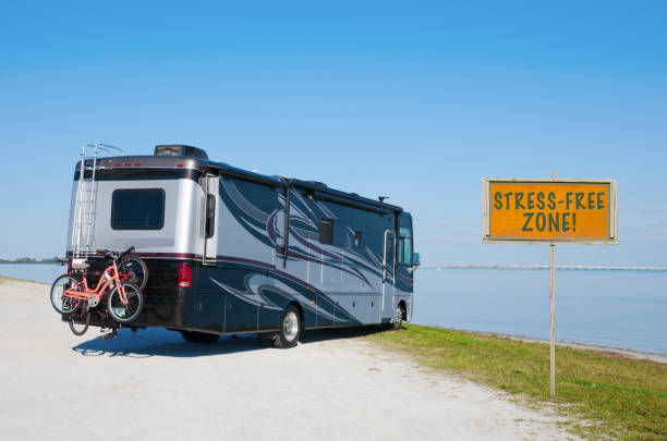 istock RV at beautiful beach with STRESS FREE ZONE! sign 827445870