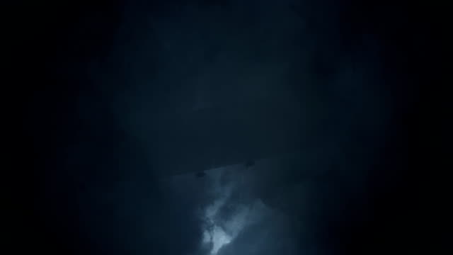 Zeppelin Flying Under Rain and Lightning Storm