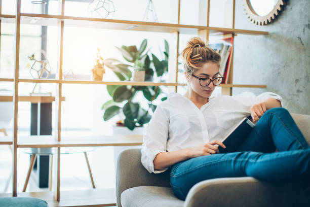 istock Young beautiful woman working in an alternative office 827449528