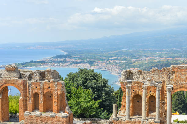 istock Taormina and the ancient Teatro Greco - Sicily, Italy 827456894