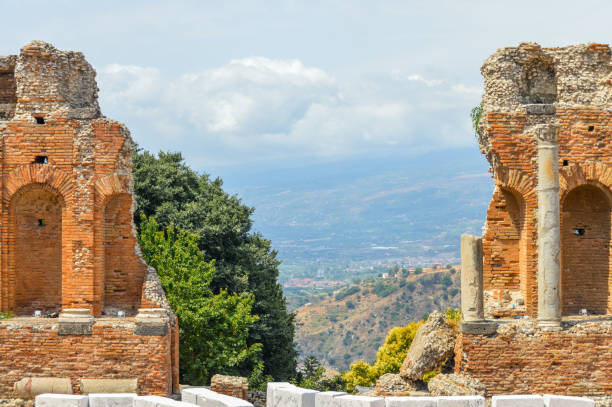 istock Taormina and the ancient Teatro Greco - Sicily, Italy 827457092