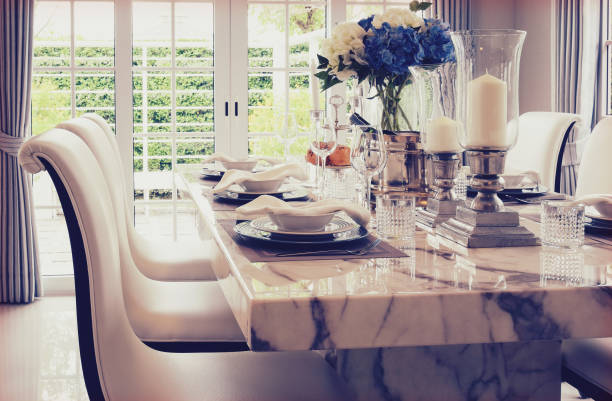 istock vintage style photo of dining table and comfortable chairs with elegant table setting 827457114