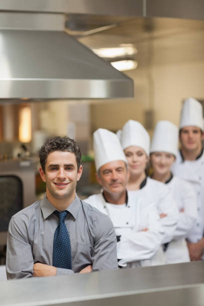 istock Waiter and Chefs 827460560