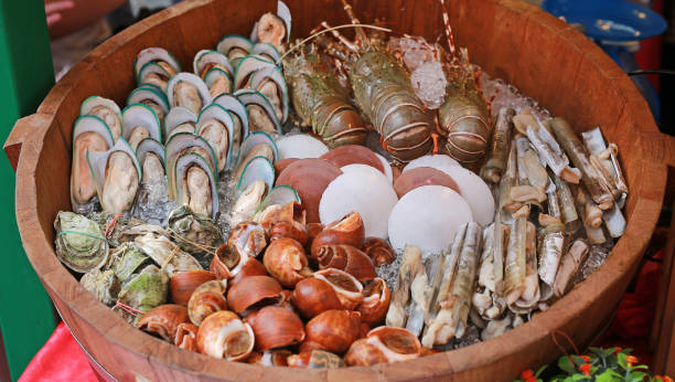 istock Fresh seafood arrangement displayed in market. 827461056