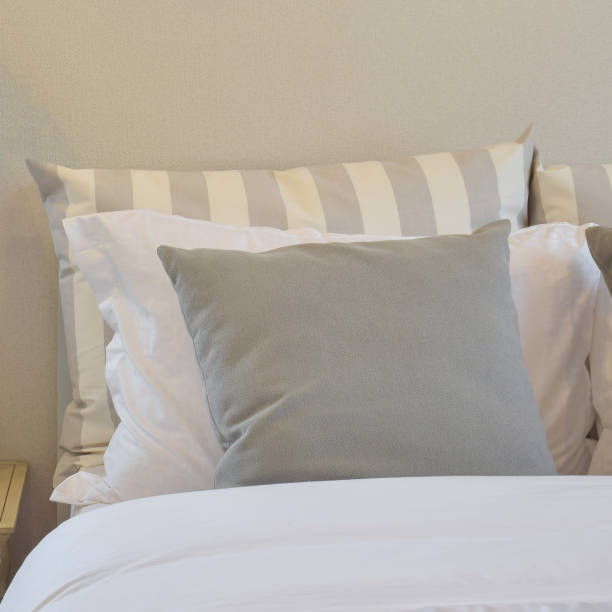 istock modern bedroom interior with gray and striped pillow on bed 827461812