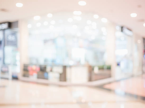 istock Abstract blur beautiful luxury interior shopping mall background. 827465302