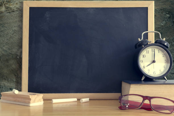 istock Chalkboard with wording Back to school and. Black board for display text or graphic design. Abstract background. Still life style. 827470702