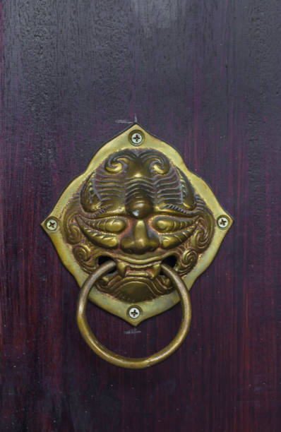 Oriental door handle , Vintage Chinese style door handle on the wood background. Oriental door handle , Vintage Chinese style door handle on the wood background. oriental spruce stock pictures, royalty-free photos & images