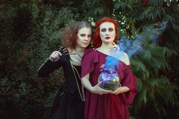 Two women are engaged in witchcraft, they are shamans and make spells.