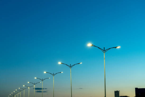 istock street lamps under blue sky at dusk 827489646