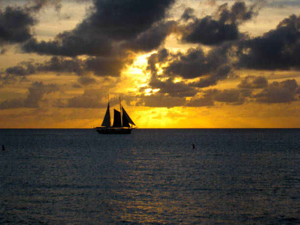 istock A sailing boat sailing in the sunset 827490338