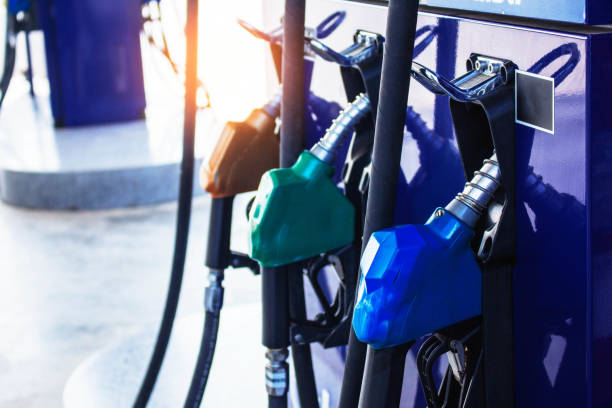 istock Fuel nozzle on gas station 827491556