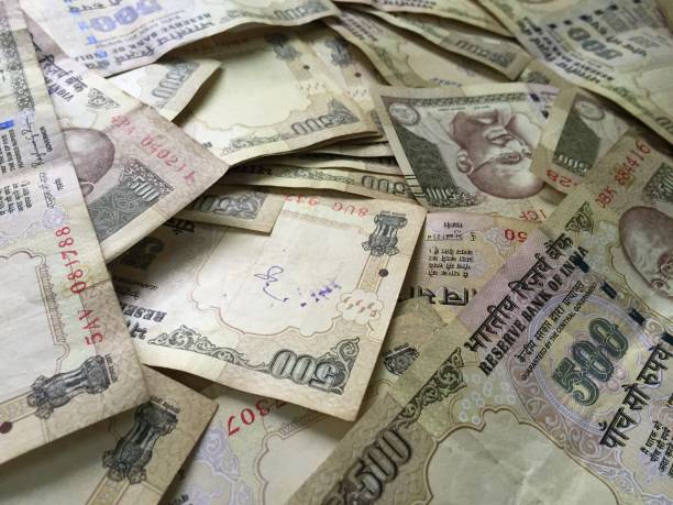 istock old five hundred Indian rupeese background 827502554