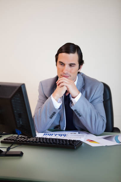 istock Businessman waiting for his pc 827502774