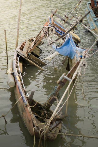 istock Sinking boat on the sea. 827502834