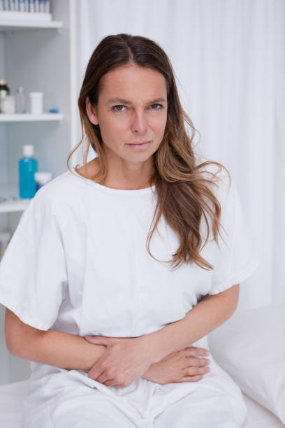 istock Woman having stomachache 827503512