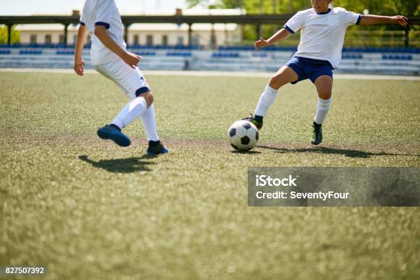 Boys Playing Football Stock Photo - Download Image Now - Soccer, Soccer Ball, Active Lifestyle