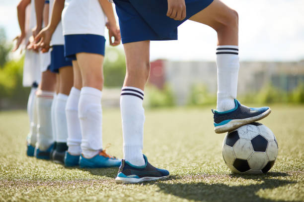 istock Junior Football Team Ready to Fight 827507522