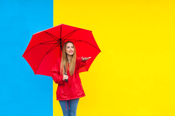 istock Young woman and colourful  wall 827520812